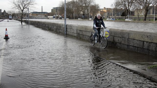 People with flooded properties should be exempt from property tax, insist Fianna F&aacute;il and Sinn F&eacute;in