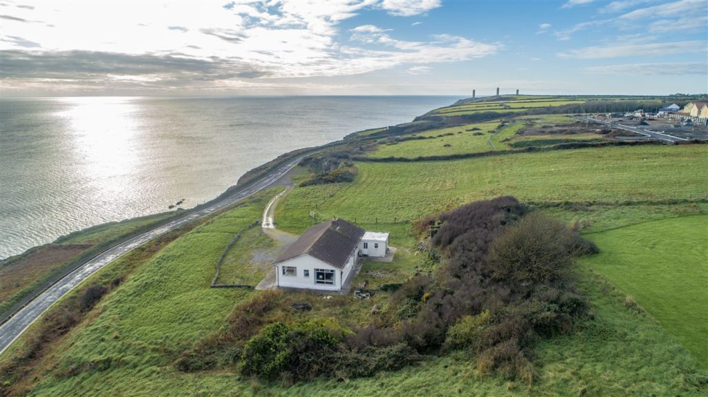 A home with huge potential with a cliffside setting